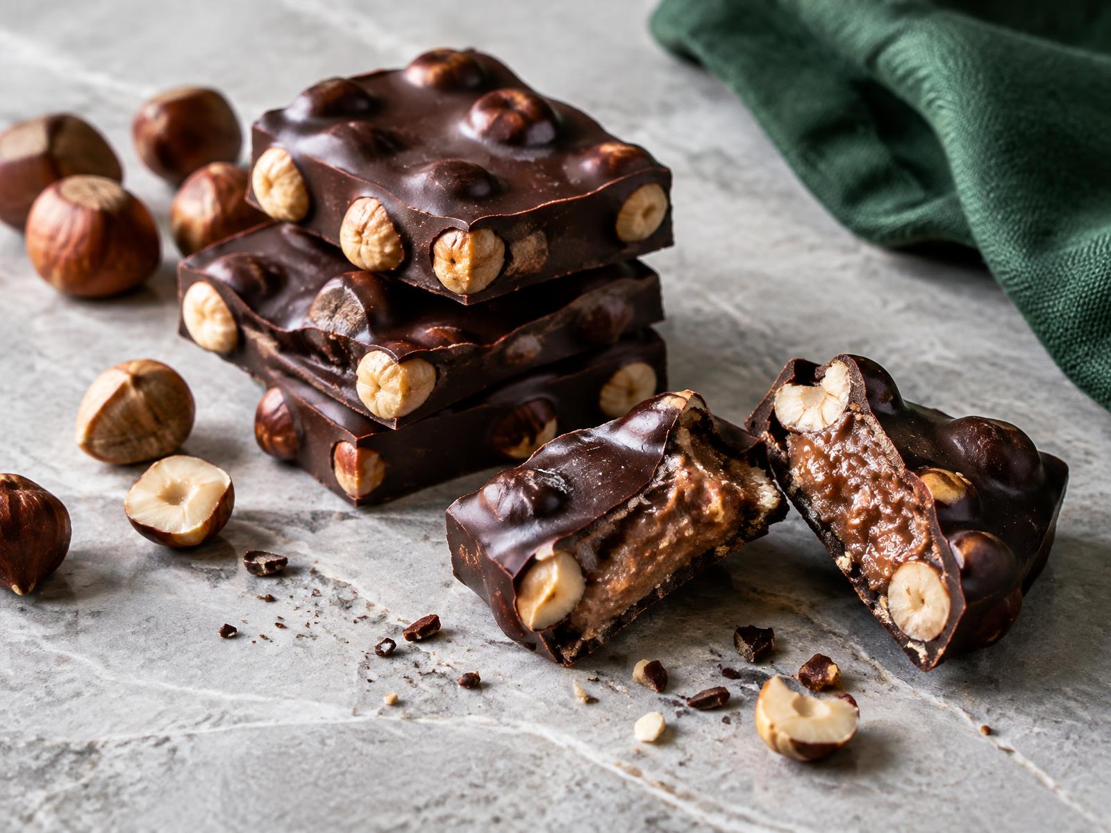 AI-generated chocolate editorial still life, not a Novi product photograph